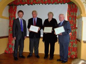 Three local stalwarts receive community awards.
Janet Farmer, Les Yarranton and John Walker receiving their awards from Richard Quallington.