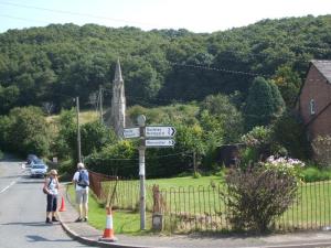 Ankerdine Hill rises behind the now redundant Church at Knightsford Bridge