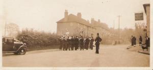 Believed to show a 1930's wedding with Bromsgrove Town Band, opposite the Cross Inn.