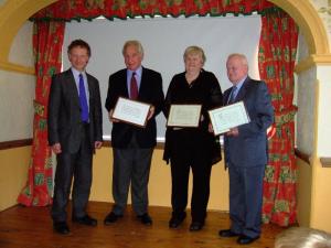 Three local stalwarts receive community awards.
Janet Farmer, Les Yarranton and John Walker receiving their awards from Richard Quallington.