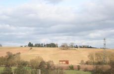 View across hay field to Westwood House
