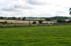 The view across the farmland looking towards Foxlydiate.